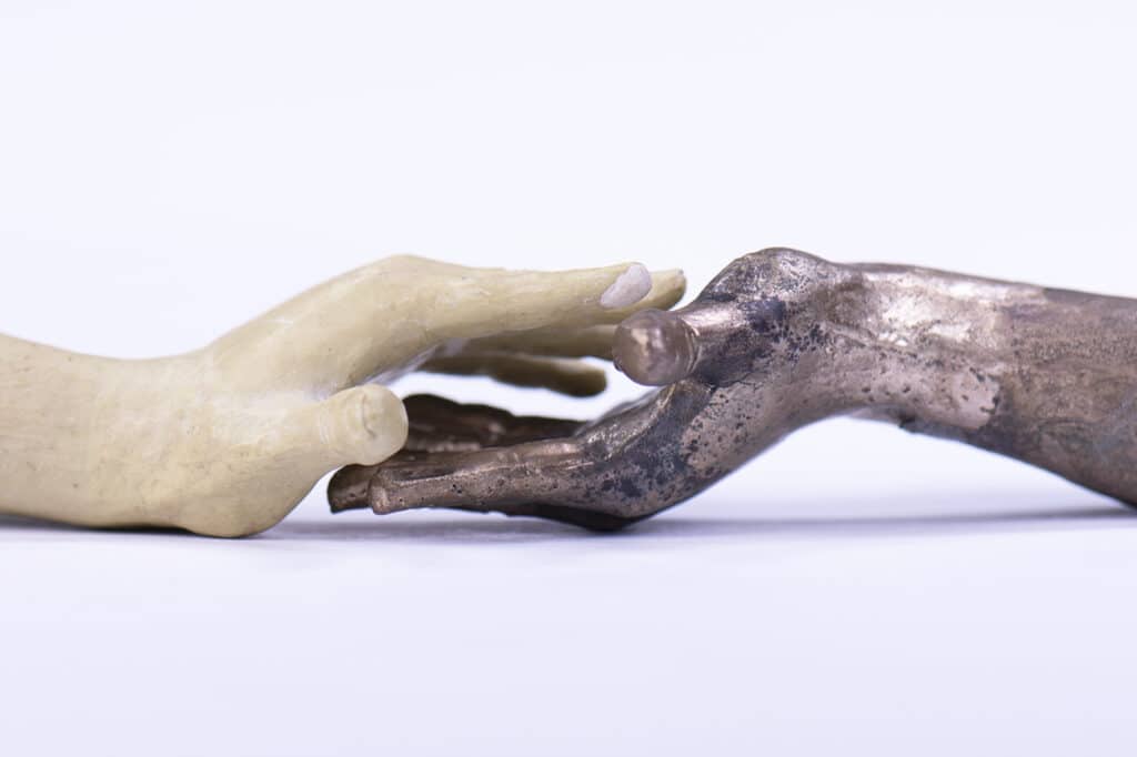 Hands, milliput model and sand-cast bronze